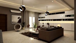 Open living room with brown couch and modern ceiling lights and a decorative chair