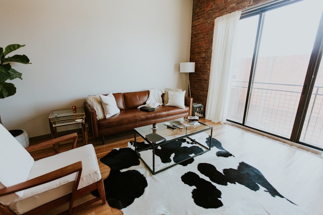 Sectioned off living room with a couch and decorative chair