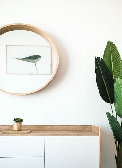 Entry way with a console table and mirror above it